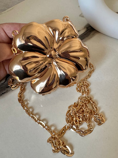 LuxeBloom Metallic Clutch