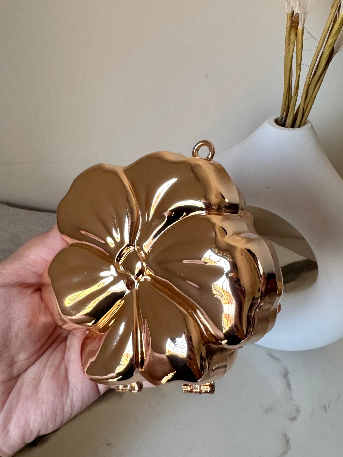 LuxeBloom Metallic Clutch